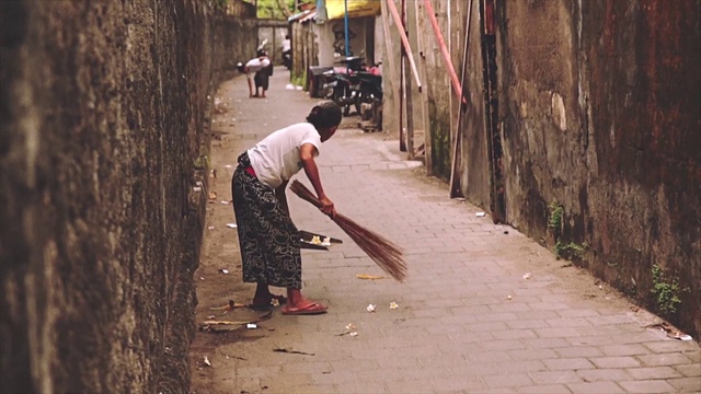 Video Reference: Wood, Road surface, Temple, Wheel, Tire, Dress, Asphalt, Neighbourhood, Flooring, Road