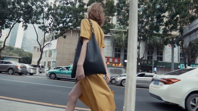 Video Reference: Car, Land vehicle, Glasses, Wheel, Tire, Photograph, Leg, Tree, Street fashion, Sleeve