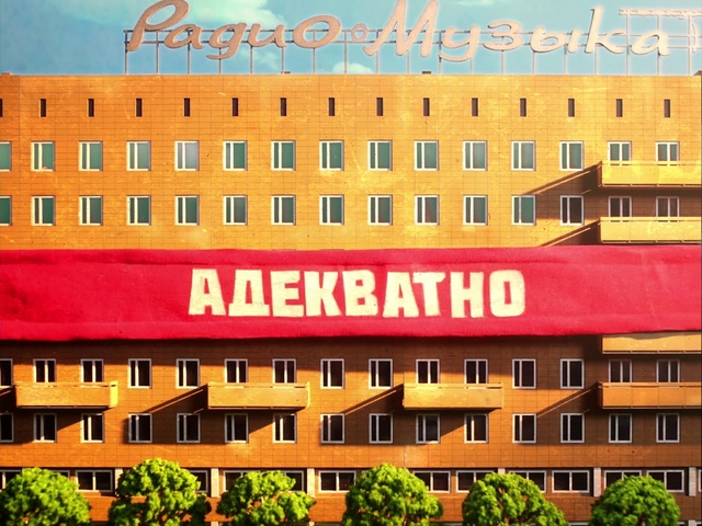 Video Reference: Building, Window, Condominium, Font, Tower block, Residential area, Urban design, Landmark, Facade, Rectangle