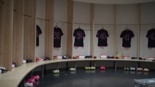 Video Reference: Building, Lighting, Interior design, Red, Fixture, Flooring, Event, T-shirt, Design, Room