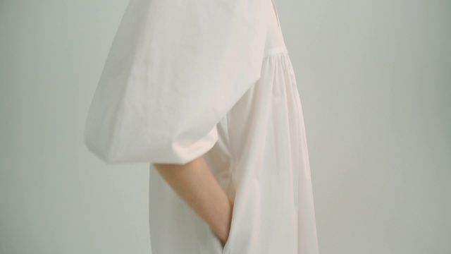 Video Reference: Dress, Human body, Sleeve, Waist, Wedding dress, Gown, Blazer, Street fashion, Bridal accessory, Fashion design