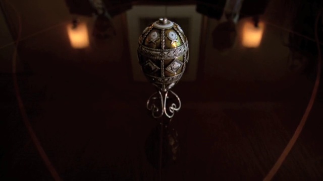 Video Reference: Automotive lighting, Darkness, Glass, Circle, Metal, Lamp, Ceiling, Art, Fashion accessory, Door handle