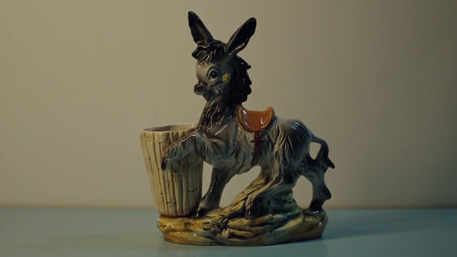 Video Reference: Head, Sculpture, Jaw, Art, Statue, Wood, Toy, Artifact, Working animal, Creative arts