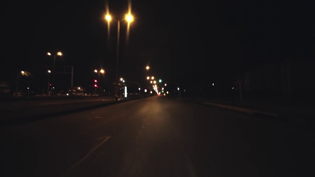 Video Reference: Automotive lighting, Street light, Road surface, Asphalt, Electricity, Thoroughfare, Road, Tints and shades, Midnight, City