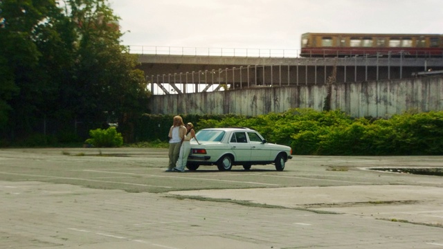 Video Reference: Tire, Wheel, Car, Plant, Vehicle, Sky, Motor vehicle, Building, Automotive design, Asphalt