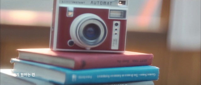 Video Reference: Digital camera, Point-and-shoot camera, Product, Camera, Camera lens, Gadget, Lens, Film camera, Material property, Cameras & optics