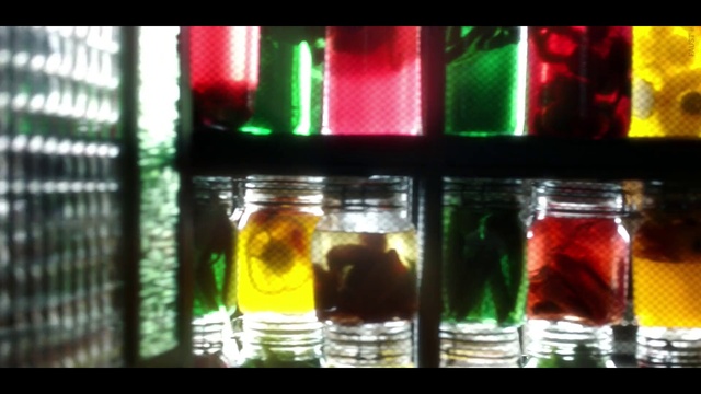 Video Reference: Drinkware, Liquid, Automotive lighting, Glass bottle, Fluid, Amber, Alcoholic beverage, Solution, Drink, Rectangle