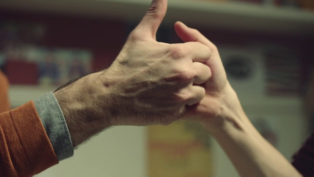 Video Reference: Arm, Human body, Neck, Gesture, Finger, Ear, Thumb, Wrist, Sign language, Nail