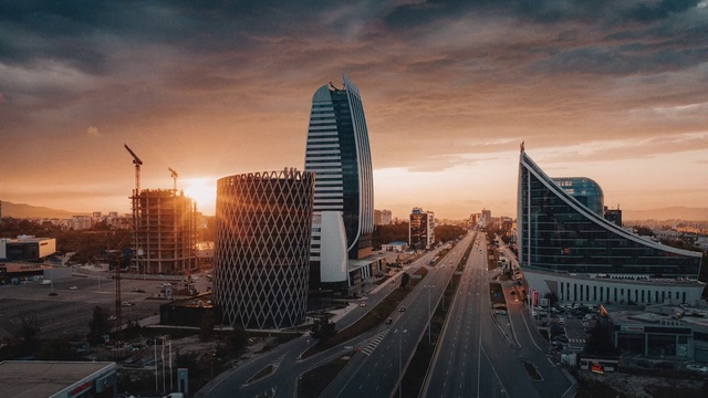 Video Reference: Sky, Cloud, Building, Skyscraper, Tower block, Dusk, Cityscape, Horizon, Condominium, Tower