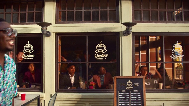 Video Reference: Window, Building, Font, Facade, Suit, City, Signage, Door, Event, Advertising