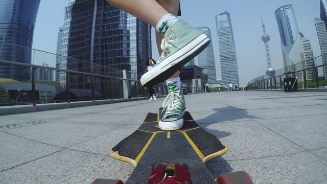 Video Reference: Photograph, Building, Leg, Skyscraper, Asphalt, Road surface, Rolling, Art, Sky, Calf