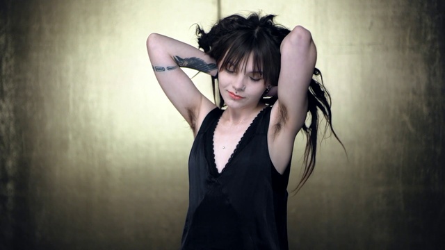 Video Reference: Lip, Hand, Eyelash, Flash photography, Neck, Sleeve, Gesture, Finger, Black hair, Smile