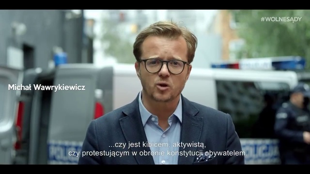 Video Reference: Glasses, Chin, Vision care, Eyebrow, Gesture, Eyewear, Flash photography, Dress shirt, Street fashion, Blazer