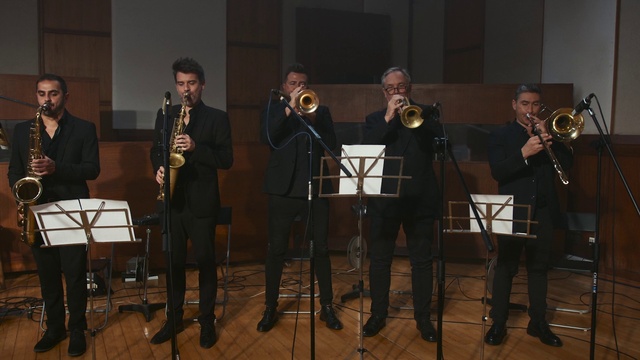 Video Reference: Music stand, Musical instrument, Brass instrument, Musician, Wind instrument, Band plays, Music, Concert, Musical instrument accessory, Entertainment