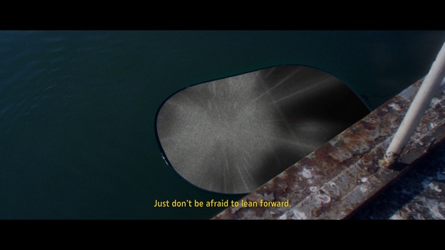 Video Reference: Chair, Font, Art, Rectangle, Metal, Automotive tire, Macro photography, Automotive wheel system, Urban design, Electric blue