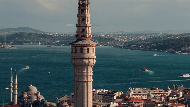 Video Reference: Water, Sky, Building, Cloud, Skyscraper, Tower, Body of water, Tower block, Lake, Urban design