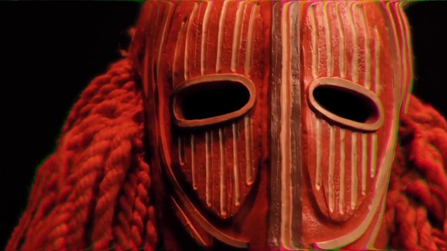 Video Reference: Eye, Wood, Orange, Eyelash, Art, Font, Personal protective equipment, Close-up, Masque, Mask