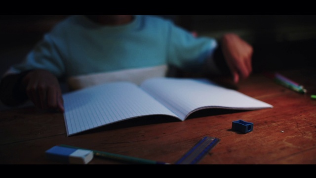 Video Reference: Hand, Table, Writing implement, Office supplies, Book, Finger, Publication, Desk, Wood, Office instrument