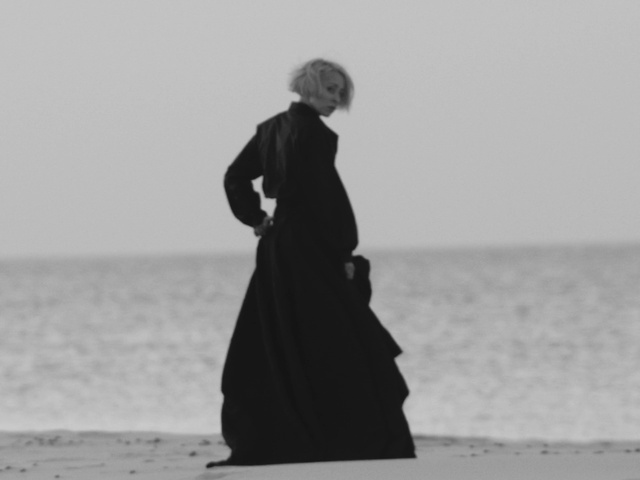 Video Reference: Water, Sky, Standing, Flash photography, People in nature, Gesture, Happy, Style, Black-and-white, Atmospheric phenomenon