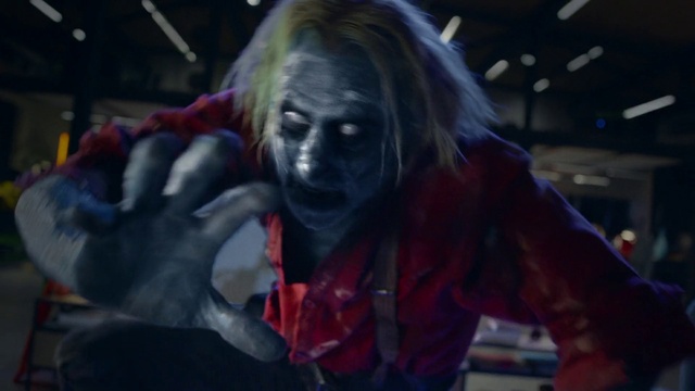 Video Reference: Zombie, Purple, Gesture, Fun, Event, Performing arts, Crowd, Entertainment, Fictional character, Darkness