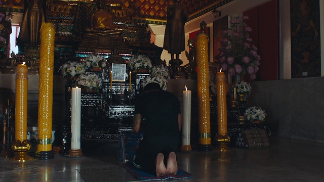 Video Reference: Temple, Building, City, Flooring, Event, Darkness, Temple, Picture frame, Place of worship, Human leg