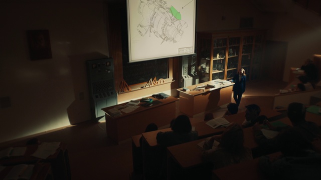 Video Reference: Table, Chair, Projection screen, Desk, Event, Display device, Multimedia, Entertainment, Space, Presentation