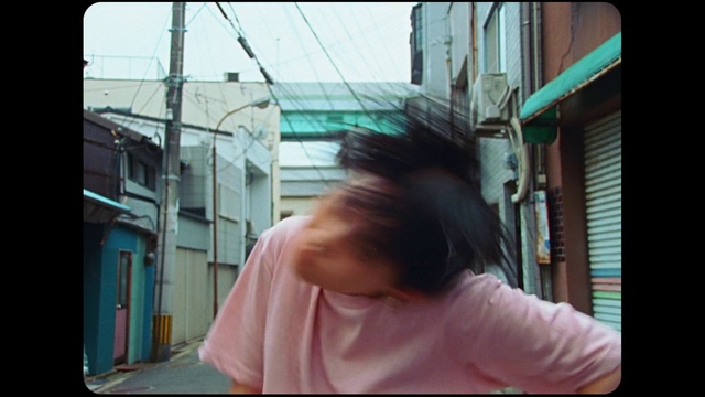 Video Reference: Window, Travel, Rectangle, Tints and shades, Street fashion, Snapshot, Magenta, Electric blue, T-shirt, Room