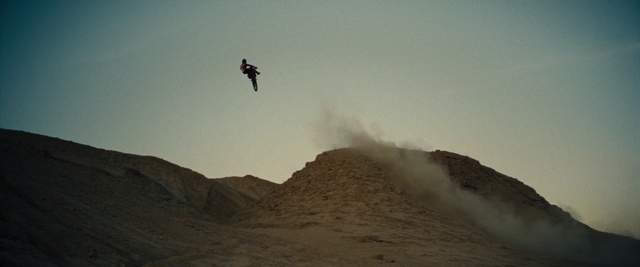 Video Reference: Sky, Cloud, Mountain, Slope, Terrain, Stunt performer, Landscape, Hill, Wind, Aeolian landform