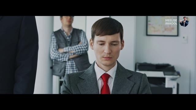 Video Reference: Hairstyle, Shoulder, Dress shirt, Flash photography, Jaw, Neck, Sleeve, Tie, Gesture, Collar