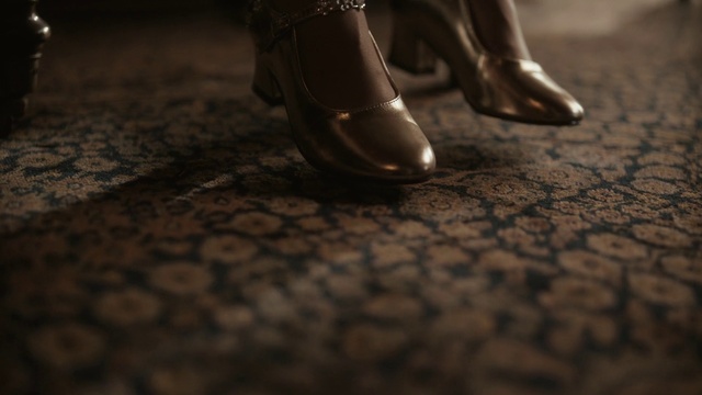 Video Reference: Brown, Shoe, Wood, Flooring, Grey, Floor, Tints and shades, Road surface, Human leg, Close-up