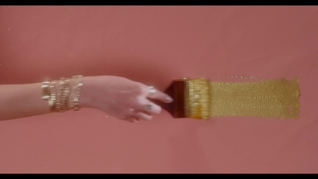 Video Reference: Hand, Sleeve, Gesture, Thumb, Nail, Body jewelry, Wrist, Wood, Jewellery, Magenta