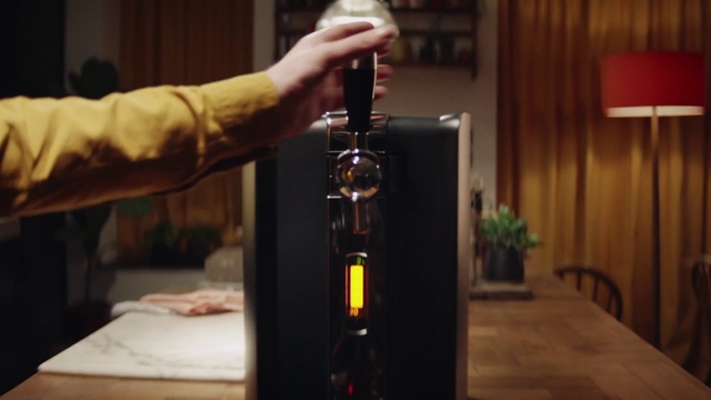 Video Reference: Drinkware, Bottle, Plant, Barware, Wine, Fluid, Kitchen appliance, Gesture, Glass bottle, Drink