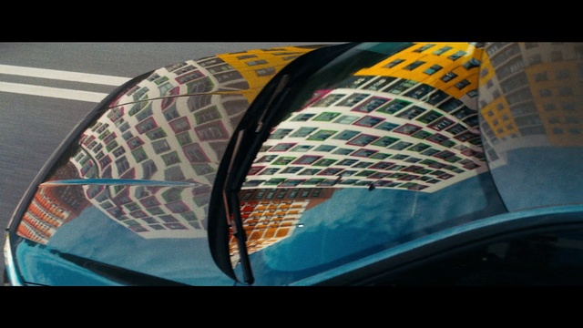 Video Reference: Hood, Automotive lighting, Umbrella, Sleeve, Rectangle, Automotive design, Font, Triangle, Tints and shades, Motor vehicle