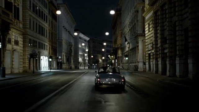 Video Reference: Building, Car, Vehicle, Automotive lighting, Window, Street light, Light, Infrastructure, Road surface, Sky