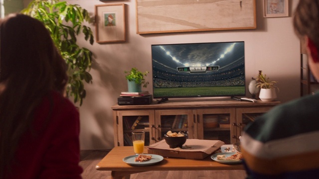 Video Reference: Table, Tableware, Interior design, Plant, Wood, Lighting, Television set, Living room, Output device, Entertainment center