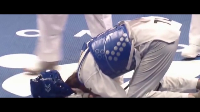 Video Reference: Jersey, Sleeve, Gesture, Flash photography, Sports uniform, Sports gear, Font, Gadget, Player, Sportswear