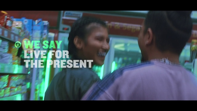 Video Reference: Font, T-shirt, Smile, Fun, Event, Display device, Television program, Entertainment, Happy, Photo caption