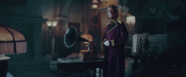 Video Reference: Purple, Standing, Flash photography, Hat, Performing arts, Musician, Entertainment, Darkness, Fashion design, Eyewear