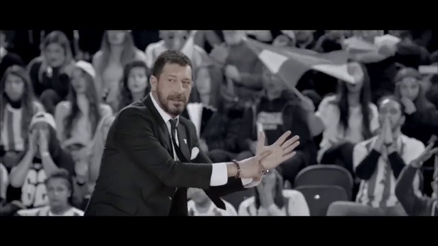 Video Reference: Shirt, Coat, Flash photography, Gesture, Black-and-white, Suit, Style, Chair, Crowd, Event