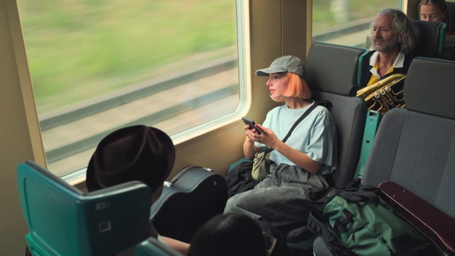 Video Reference: Train, Hat, Shorts, Leisure, Passenger, Travel, Baseball cap, Fun, Public transport, Cap
