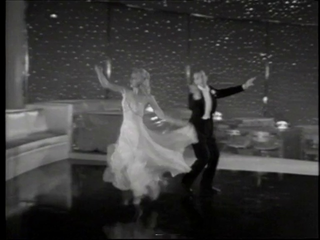 Video Reference: Dress, Flash photography, Dance, Gesture, Happy, Entertainment, Black-and-white, Performing arts, Choreography, Event