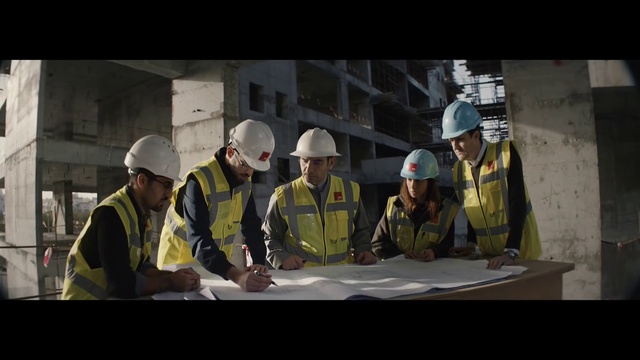 Video Reference: Helmet, Hard hat, Workwear, Tradesman, High-visibility clothing, Engineer, Sleeve, Construction worker, Personal protective equipment, Engineering