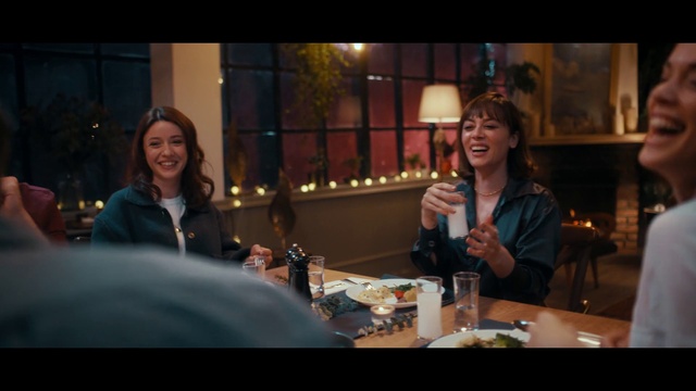 Video Reference: Smile, Tableware, Facial expression, Table, Drinkware, Interaction, Flash photography, Drink, Barware, Alcoholic beverage