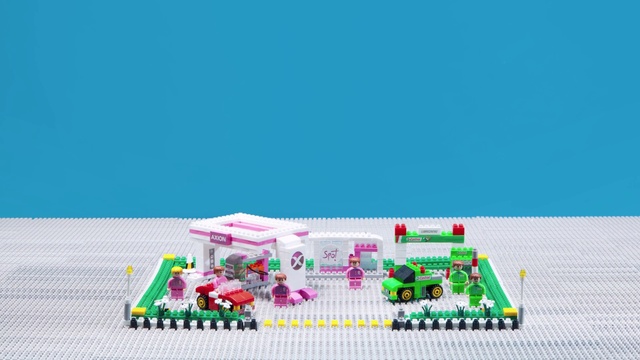 Video Reference: Rectangle, Toy block, Toy, Building sets, Lego, Font, Urban design, Construction set toy, Grass, Games