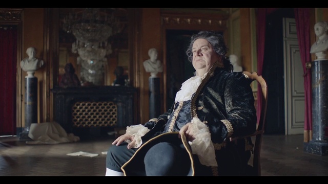 Video Reference: Entertainment, Performing arts, Chair, Music, Artist, Folk instrument, Musician, Event, Flash photography, Musical instrument