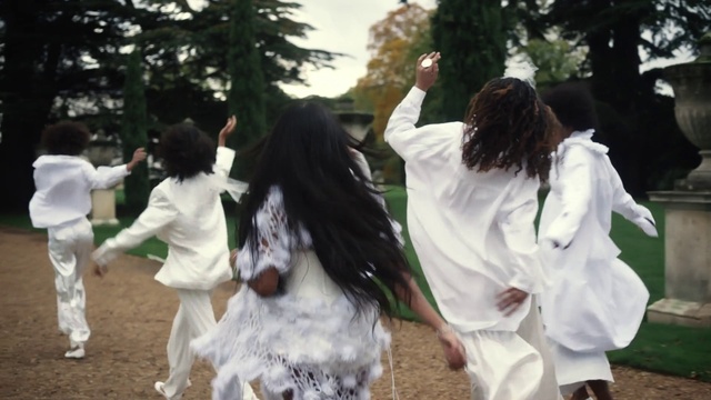 Video Reference: Tree, Gesture, Happy, Plant, Event, Fun, Entertainment, Walking, Recreation, Sky