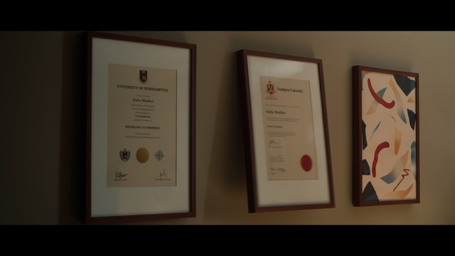 Video Reference: Brown, Font, Event, Art, Collection, Circle, Carmine, Room, Picture frame, Paper