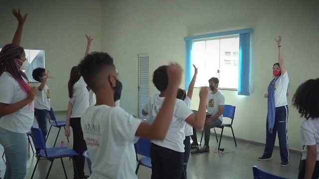 Video Reference: Gesture, Chair, Window, T-shirt, Event, Leisure, Class, Service, Training, Visual arts