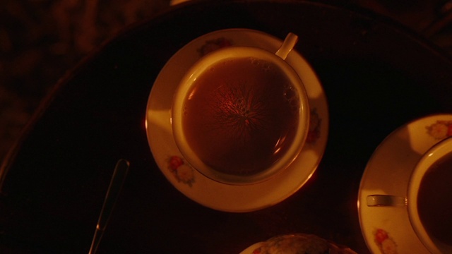 Video Reference: Drinkware, Automotive lighting, Kitchen utensil, Cup, Dishware, Amber, Liquid, Ingredient, Fluid, Tableware