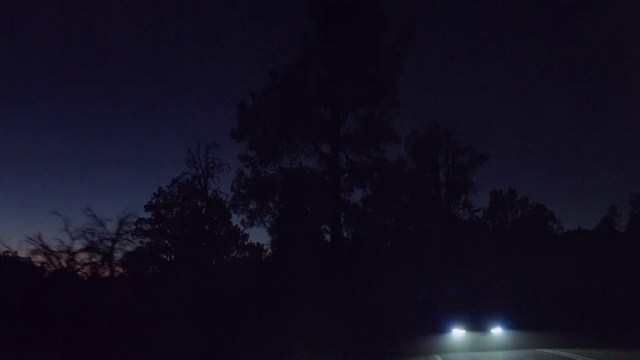 Video Reference: Atmosphere, Automotive lighting, Sky, Natural landscape, Lighting, Tree, Atmospheric phenomenon, Cloud, Woody plant, Road surface